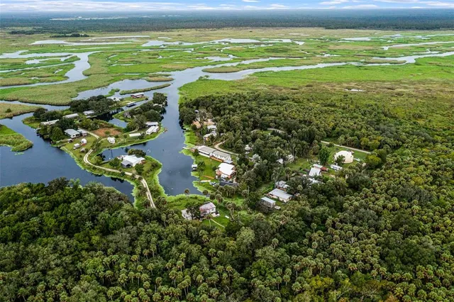 a view of a lake with a house