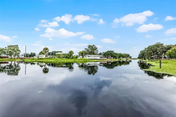 a view of a lake with a houses