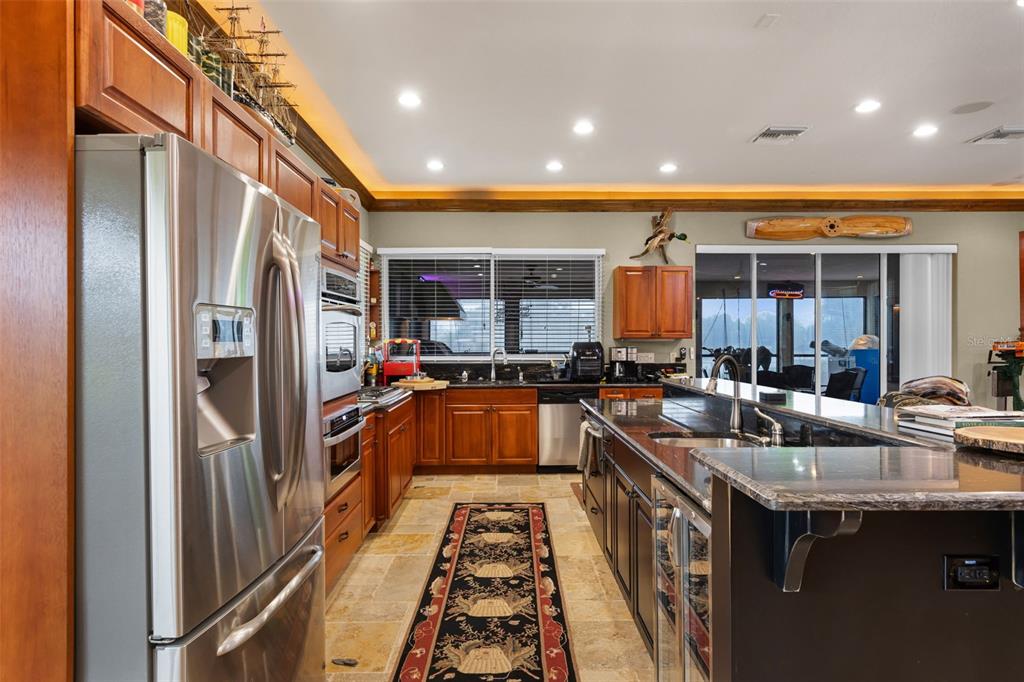 8270 Baxter Point North Mims, FL 32754 - Photo 7 of 50 a kitchen with lots of counter top space