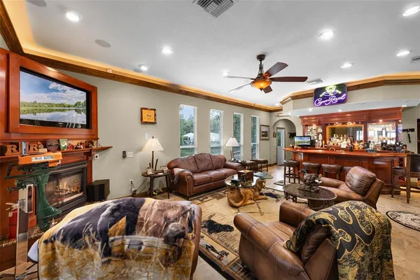 a very nice looking living room with furniture and a flat screen tv