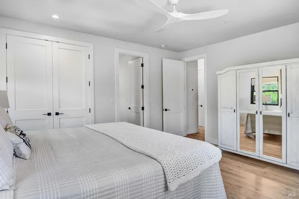 a view of swimming pool with outdoor seating and plants
