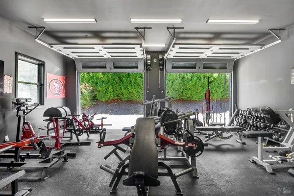 an aerial view of houses with outdoor space