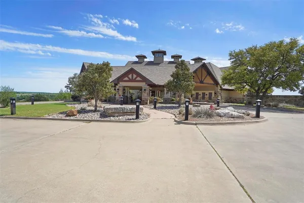 a house with palm tree in front of it