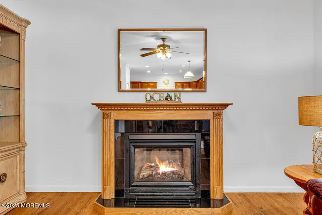 a fireplace with a clock on top of it