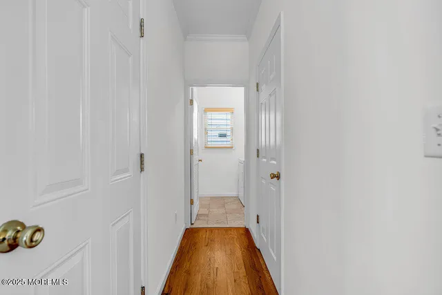 a view of a bathroom from the hallway