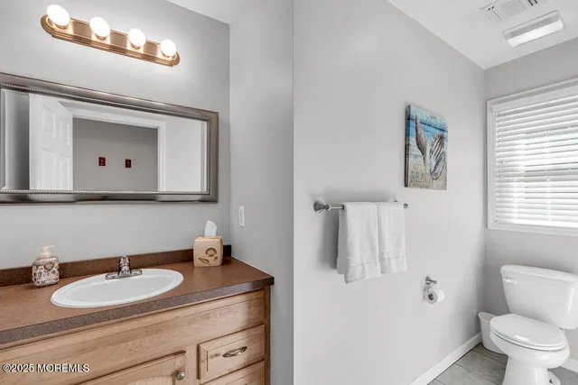 a bathroom with a shower and toilet