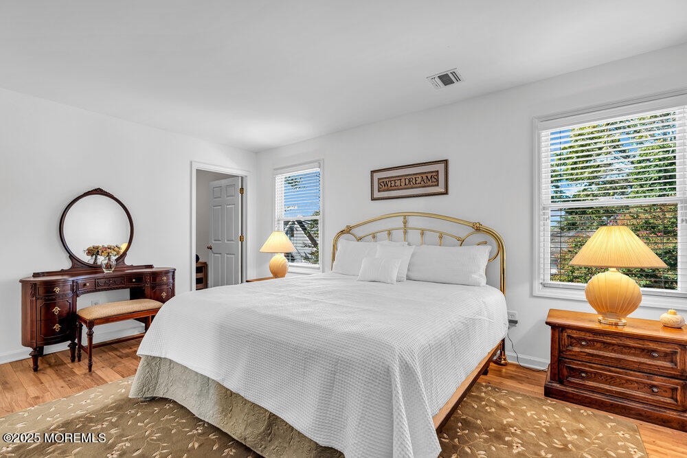 1825 Pine Terrace Lake Como, NJ 07719 - Photo 27 of 53 a bedroom with bed and a window