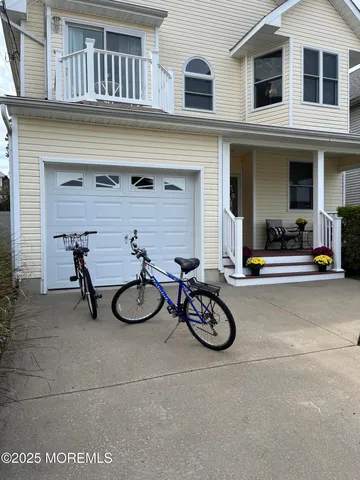 a couple of chairs in front of building