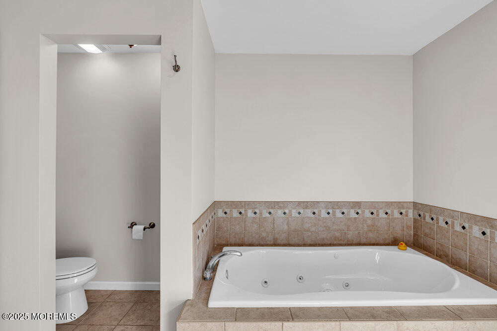 1825 Pine Terrace Lake Como, NJ 07719 - Photo 31 of 53 a bathroom with a bathtub and toilet