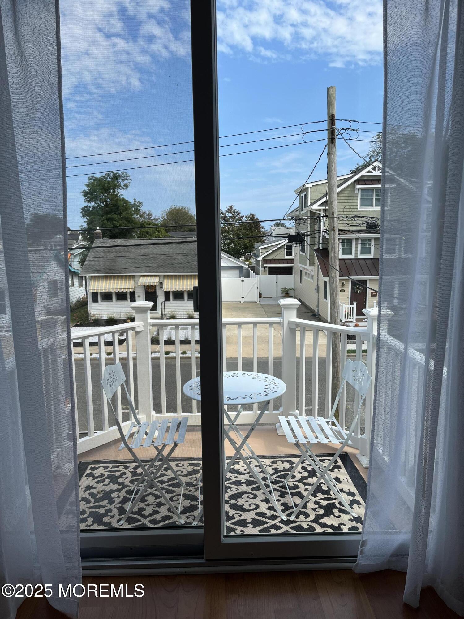 1825 Pine Terrace Lake Como, NJ 07719 - Photo 37 of 53 a view of a glass door with a from a balcony
