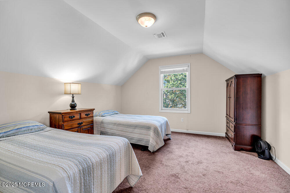 1825 Pine Terrace Lake Como, NJ 07719 - Photo 40 of 53 a bedroom with two beds and a window