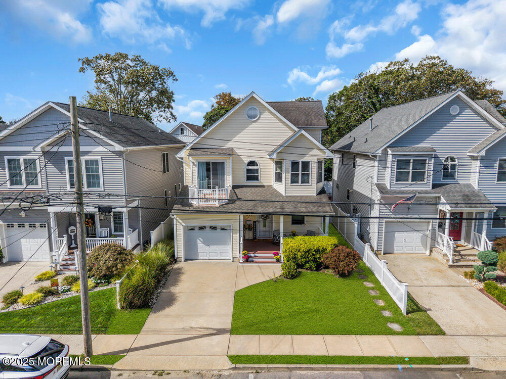 1825 Pine Terrace Lake Como, NJ 07719 - Photo 4 of 53 a front view of a house with a yard and potted plants