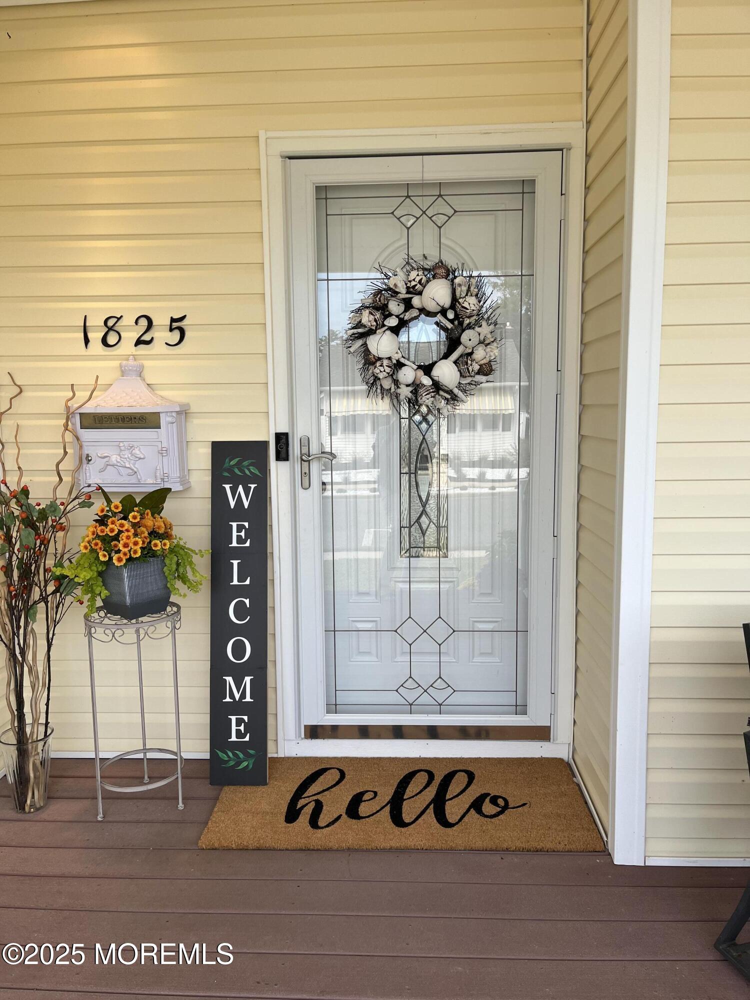 1825 Pine Terrace Lake Como, NJ 07719 - Photo 7 of 53 a vase of flowers sitting on a table
