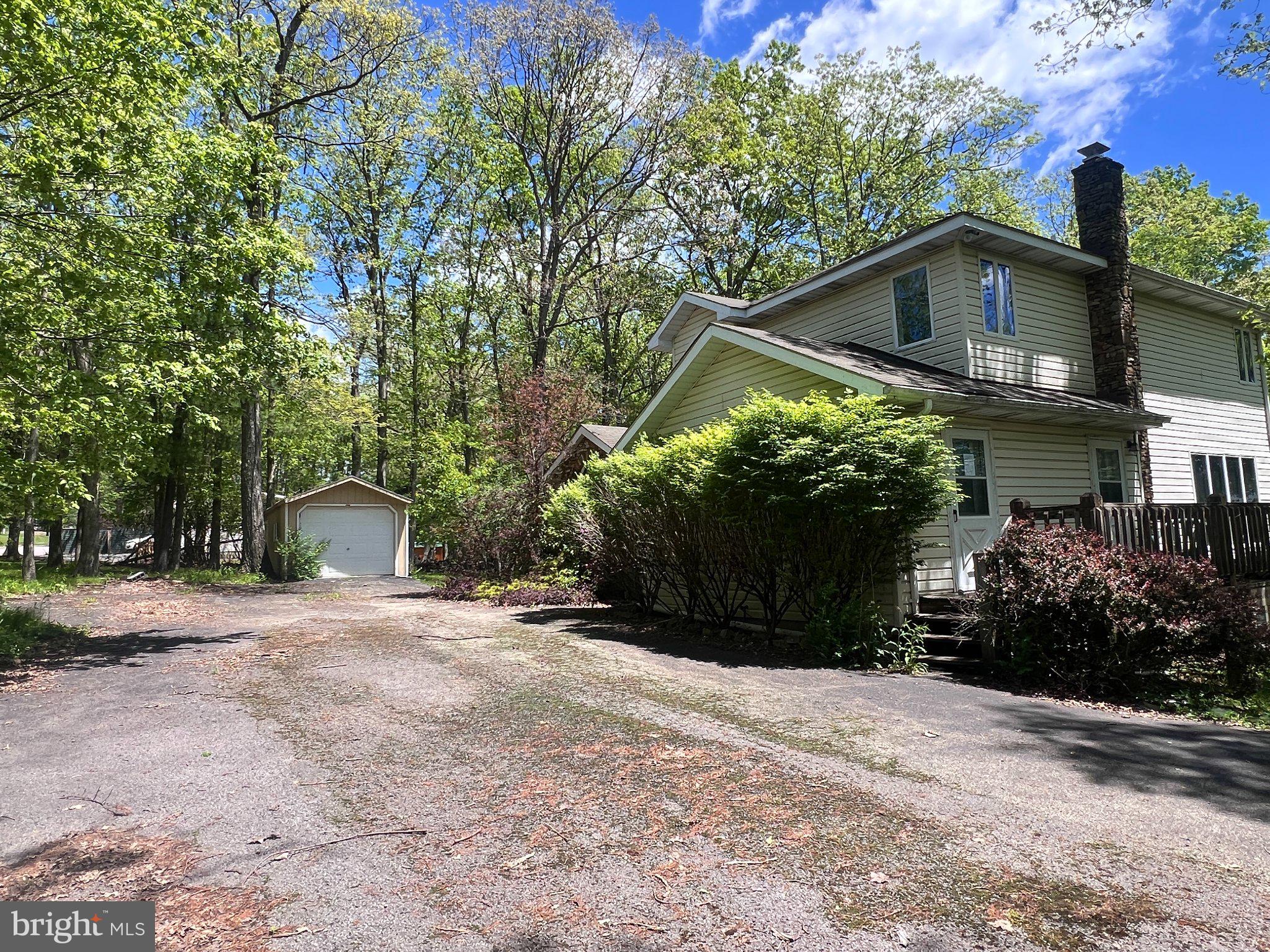 198 Pysell Road McHenry, MD 21541 - Photo 52 of 52 Charming home nestled in lush greenery.