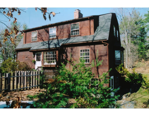 116 Tower Road Lincoln, MA 01773 - Photo 1 of 1 a view of a house with brick walls and plants