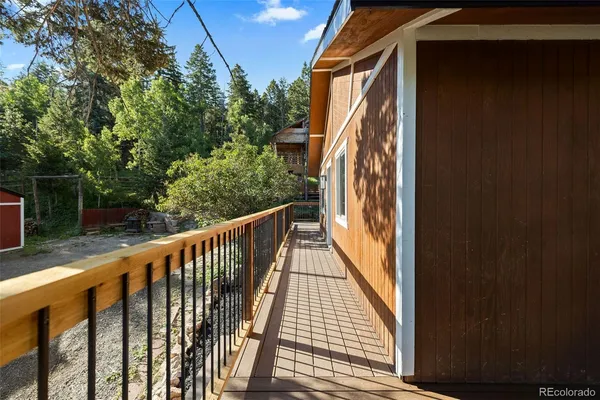 a view of balcony with a wooden floor
