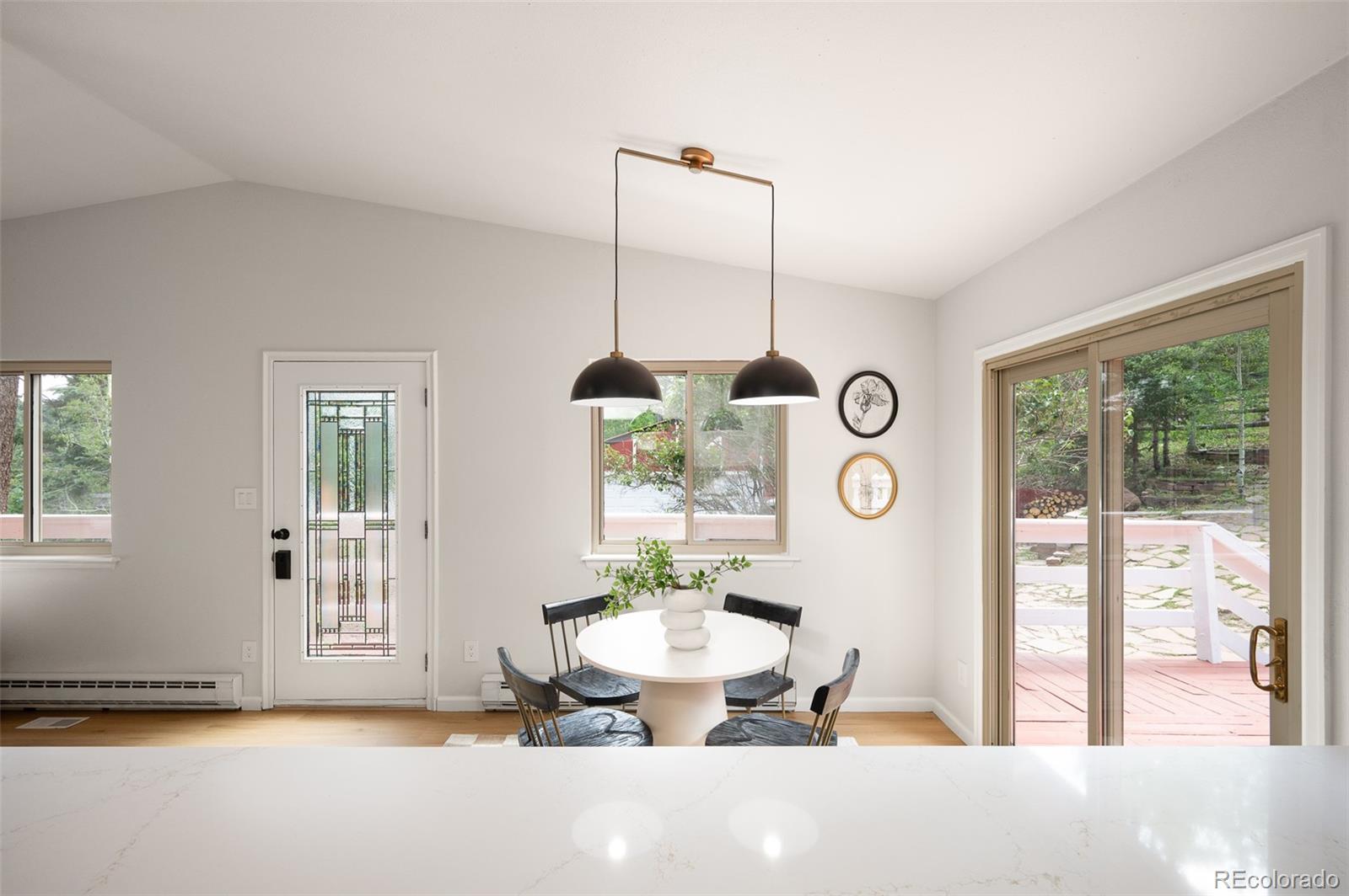 19424 Silver Ranch Road Conifer, CO 80433 - Photo 4 of 34 a view of a living room and window