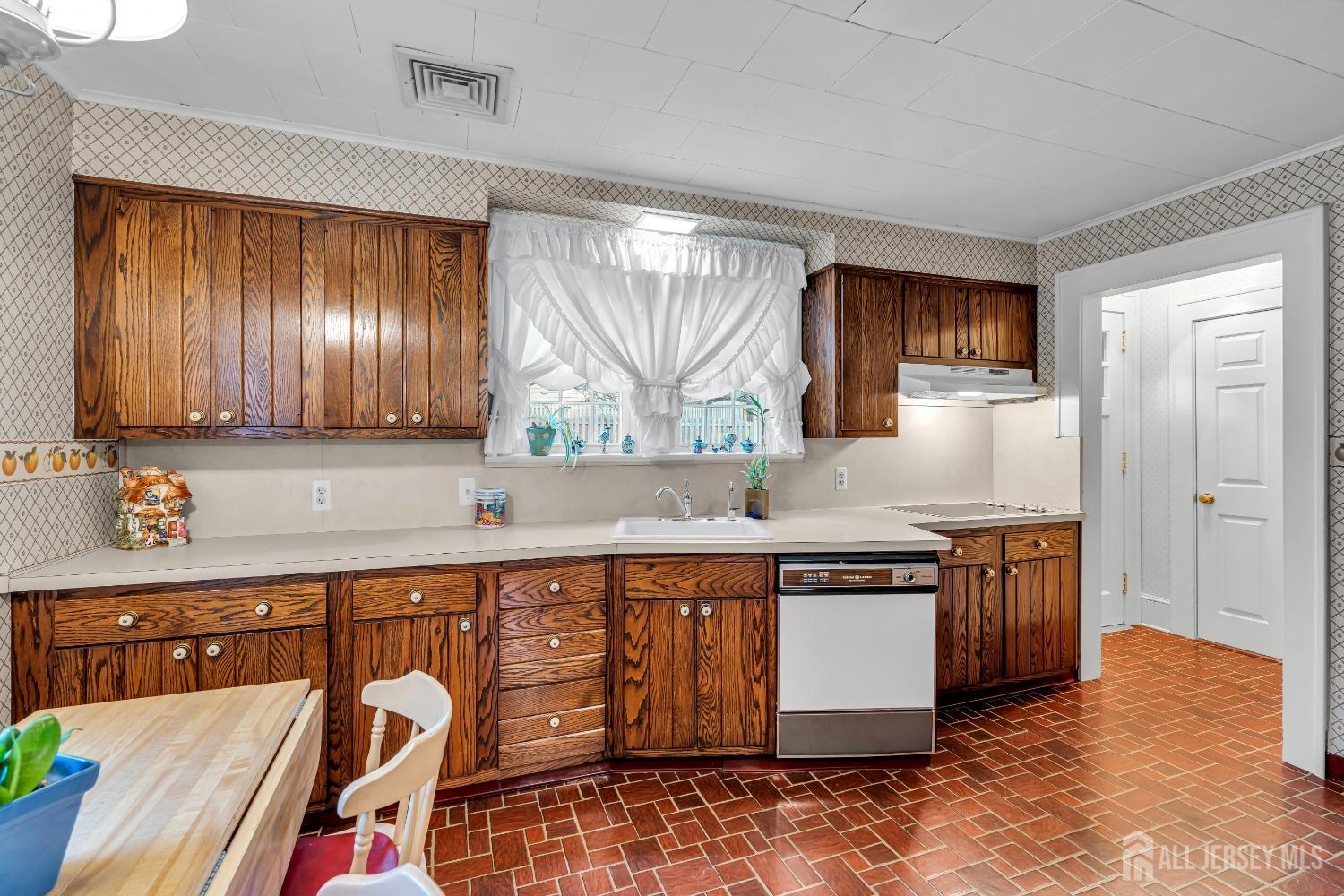 3 Edgemere Drive Matawan, NJ 07747 - Photo 16 of 43 a kitchen with stainless steel appliances granite countertop a sink and cabinets