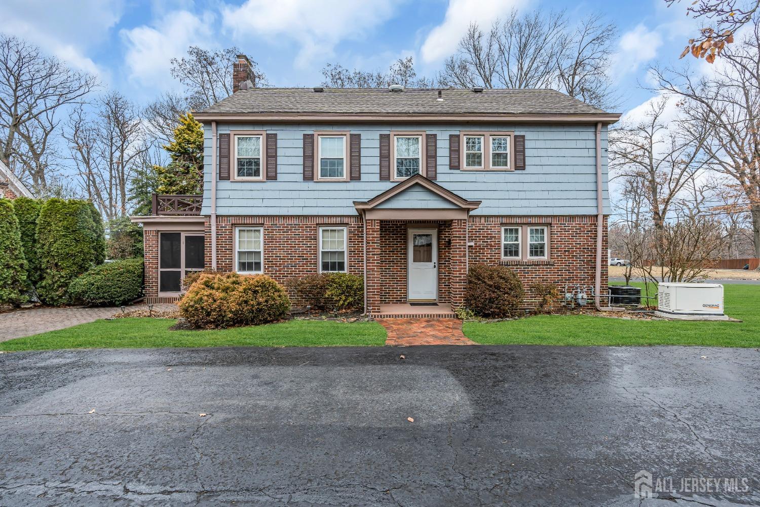 3 Edgemere Drive Matawan, NJ 07747 - Photo 2 of 43 a front view of a house with a yard and garage