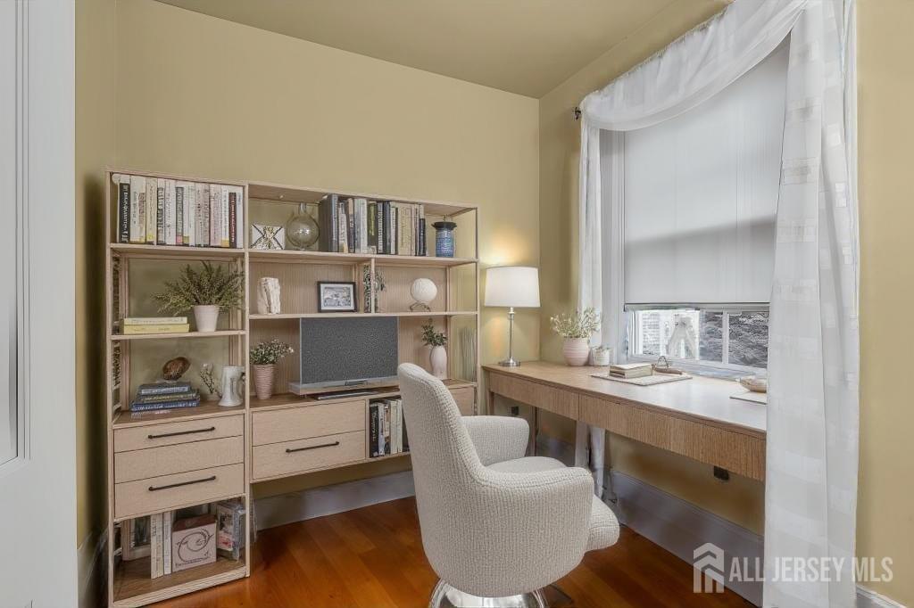 3 Edgemere Drive Matawan, NJ 07747 - Photo 23 of 43 a dining room with furniture and a wooden floor