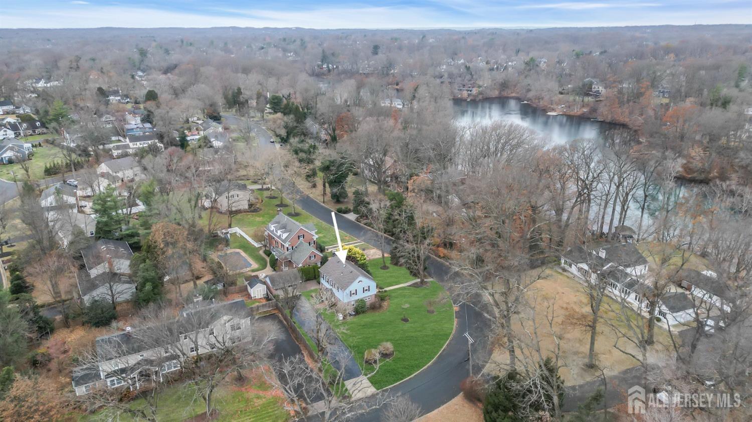 3 Edgemere Drive Matawan, NJ 07747 - Photo 33 of 43 a view of a lake with a mountain in the background