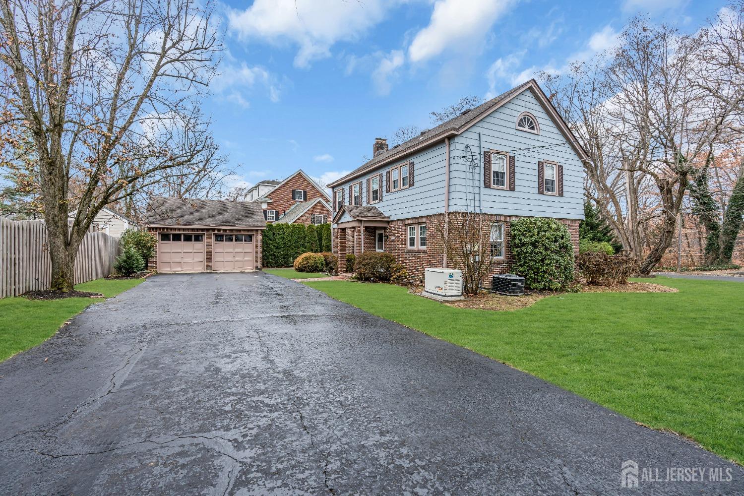 3 Edgemere Drive Matawan, NJ 07747 - Photo 34 of 43 a front view of a house with garden