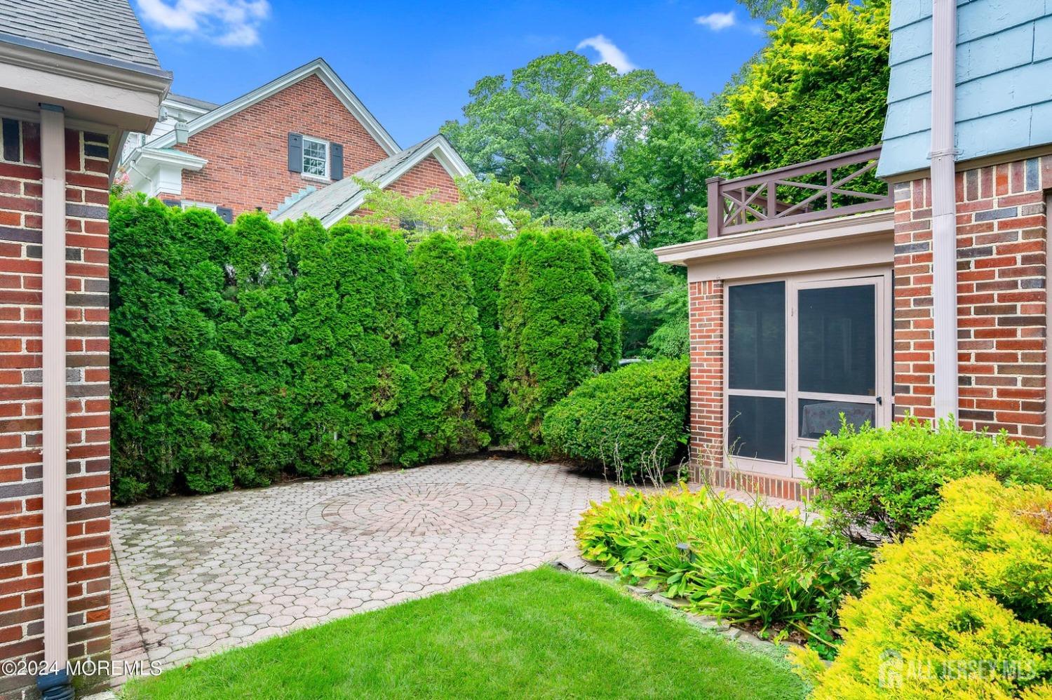 3 Edgemere Drive Matawan, NJ 07747 - Photo 35 of 43 a front view of a house with garden