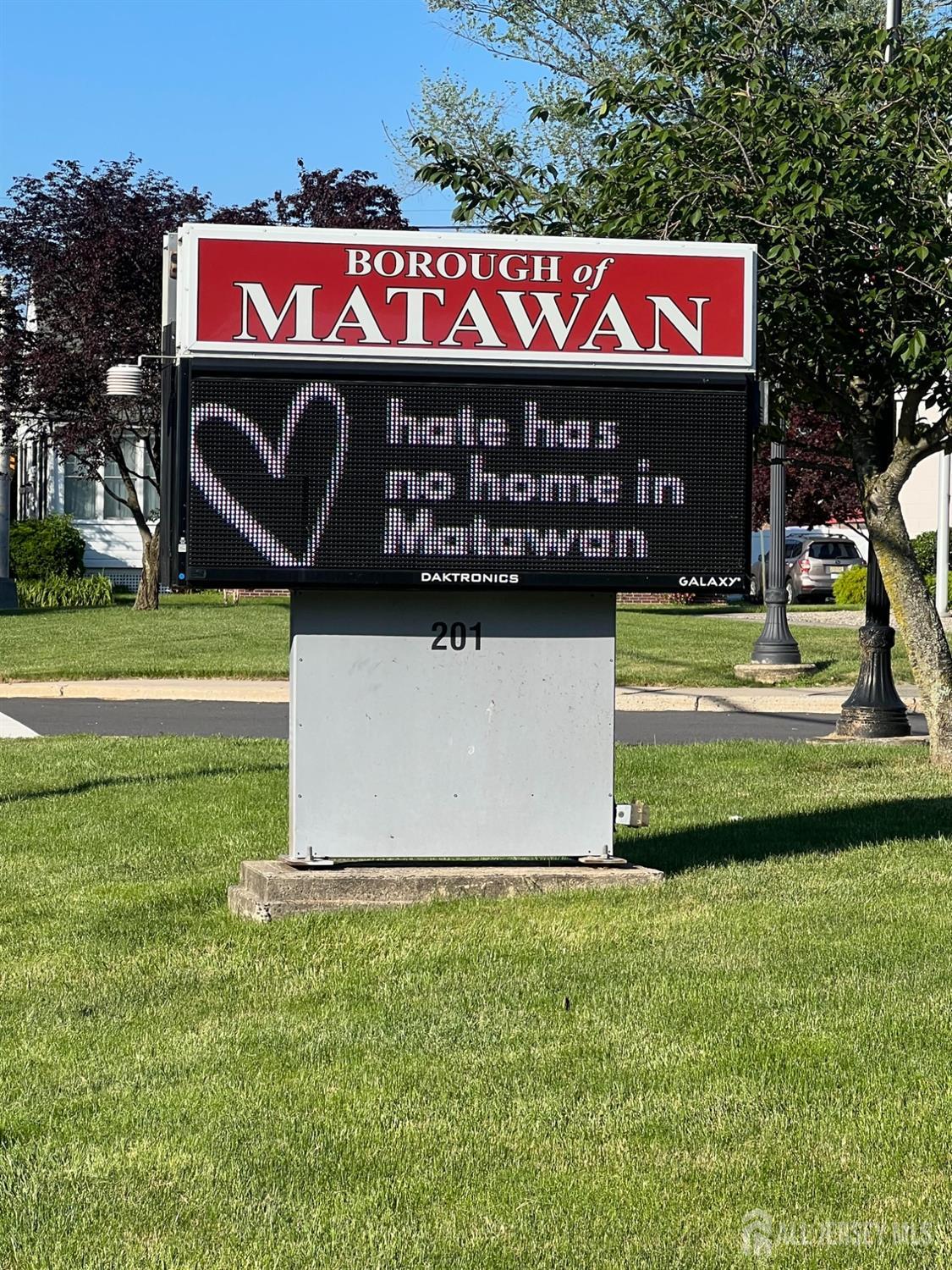 3 Edgemere Drive Matawan, NJ 07747 - Photo 40 of 43 a sign on the side of the building