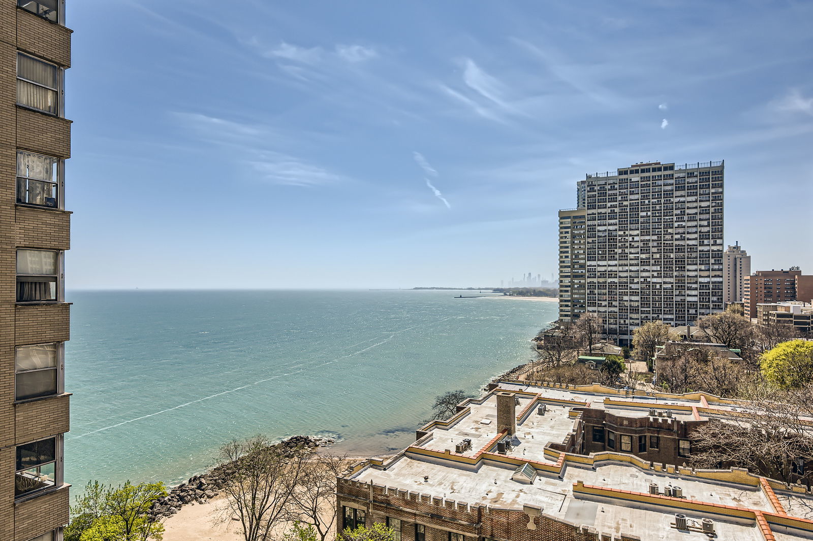 6301 North Sheridan Road, Unit 10F Chicago, IL 60660 - Photo 19 of 19 a view of a city with tall buildings