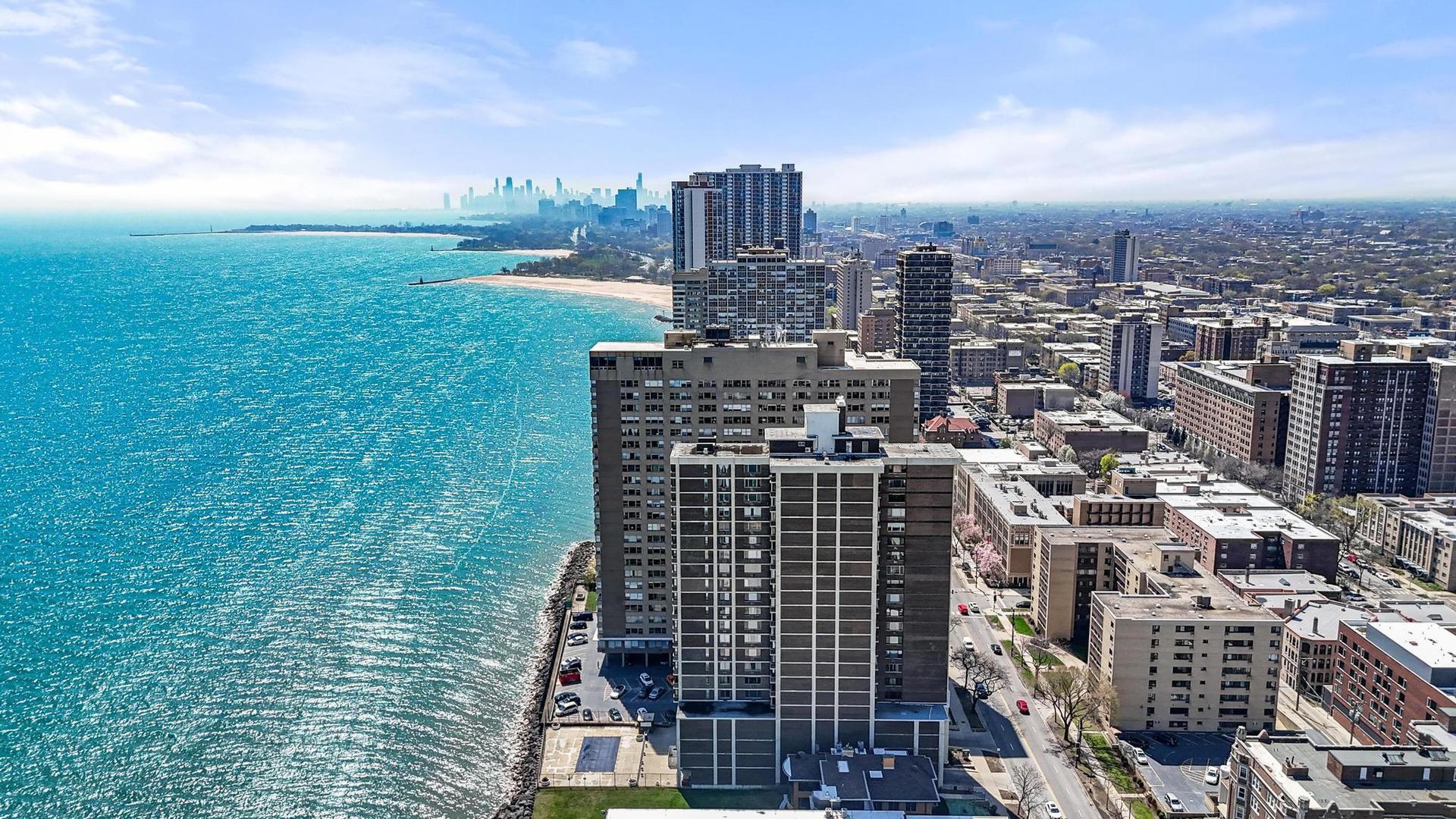 6301 North Sheridan Road, Unit 10F Chicago, IL 60660 - Photo 3 of 19 a view of a city with tall buildings