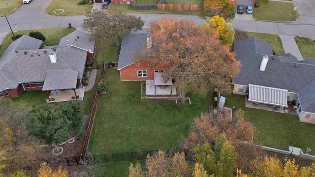 an aerial view of a house with a garden
