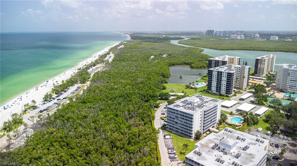 5 Bluebill Avenue, Unit 105 Naples, FL 34108 - Photo 7 of 26 a view of lake with city view