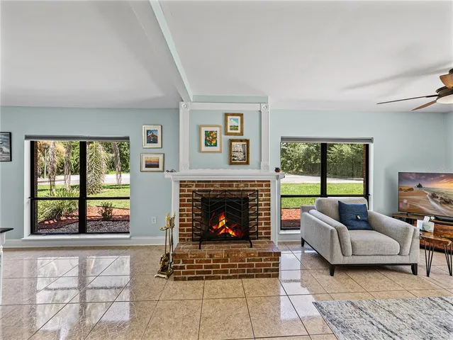 a view of a livingroom with furniture and window