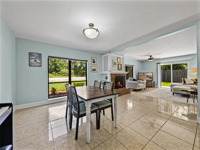 a kitchen with stainless steel appliances granite countertop a stove a sink dishwasher and a refrigerator