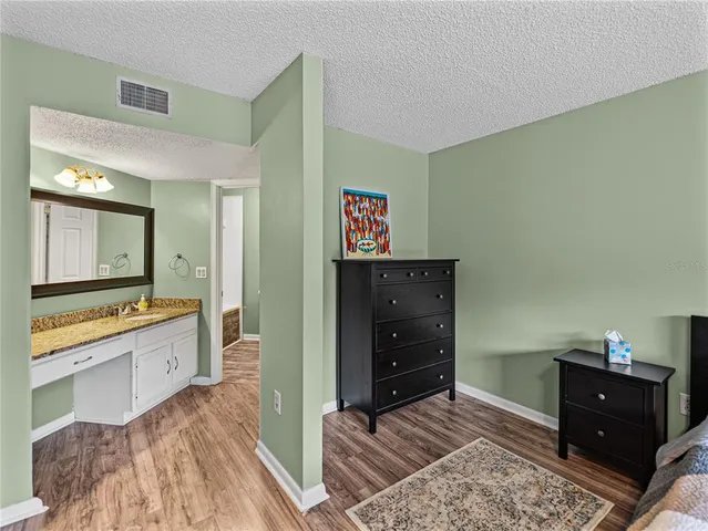 a view of balcony with wooden floor