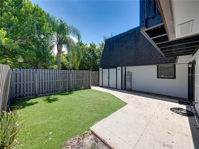 a view of a lake with a yard