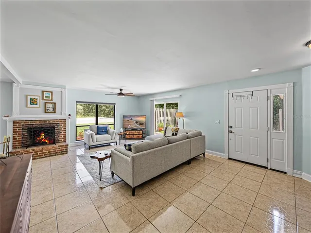 a view of hall way with furniture