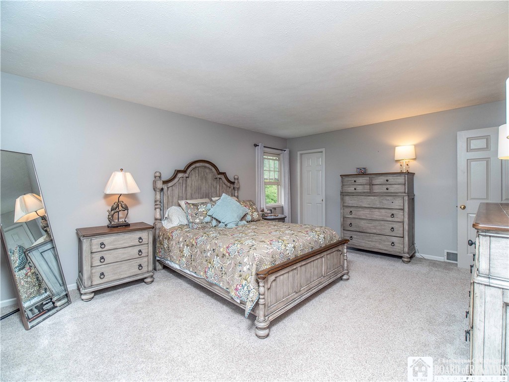 5616 Stow Road North Harmony, NY 14710 - Photo 23 of 37 Primary Bedroom Suite