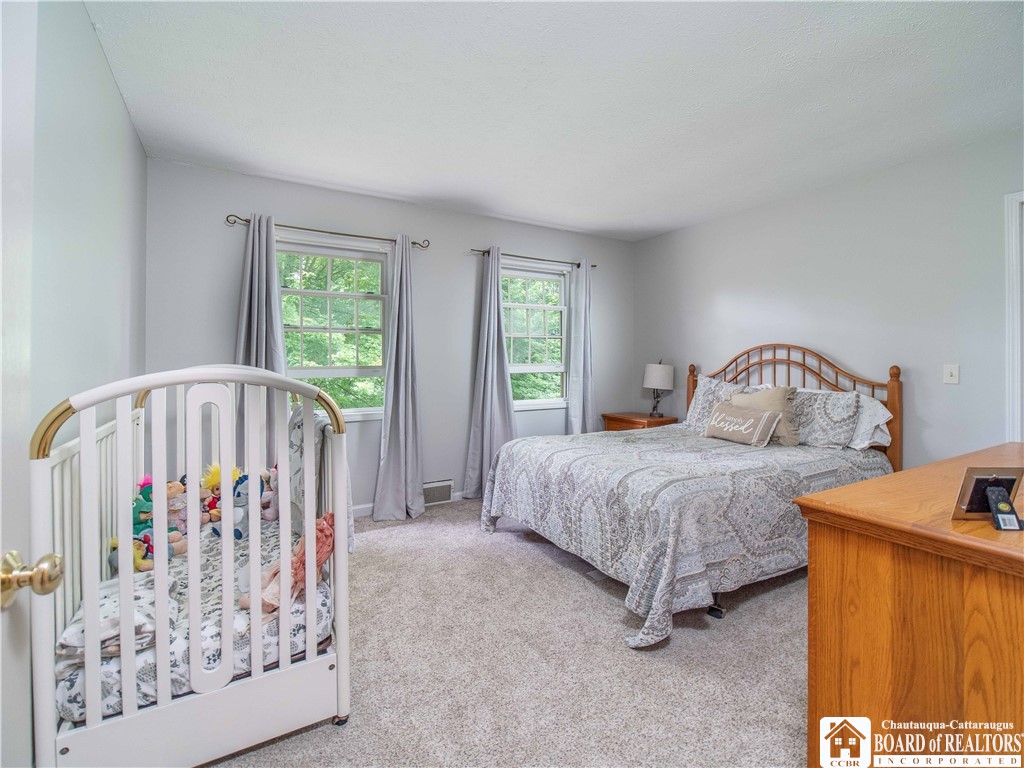 5616 Stow Road North Harmony, NY 14710 - Photo 28 of 37 3rd bedroom on the 2nd floor. Fresh wall to wall c