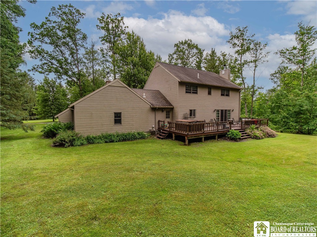 5616 Stow Road North Harmony, NY 14710 - Photo 4 of 37 View of the back Yard With Deck