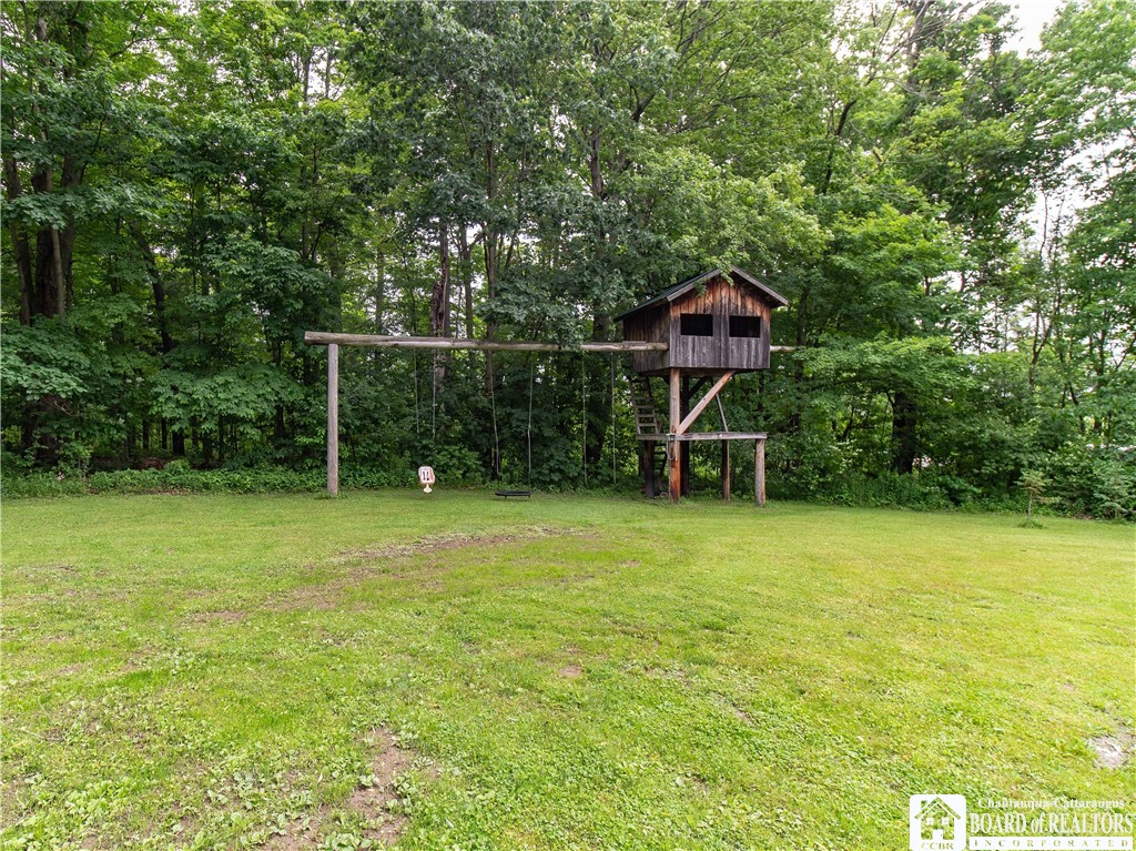 5616 Stow Road North Harmony, NY 14710 - Photo 7 of 37 Swing Set will stay with the home .