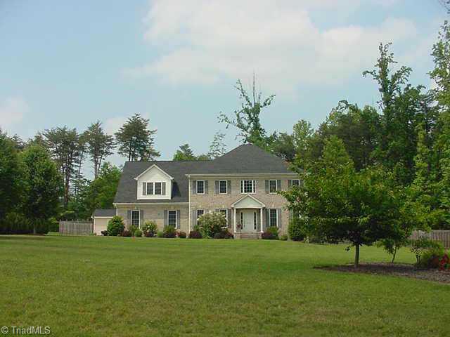 8202 Kelly Ford Road Oak Ridge, NC 27310 - Photo 1 of 9 Exterior Front. new ext photo