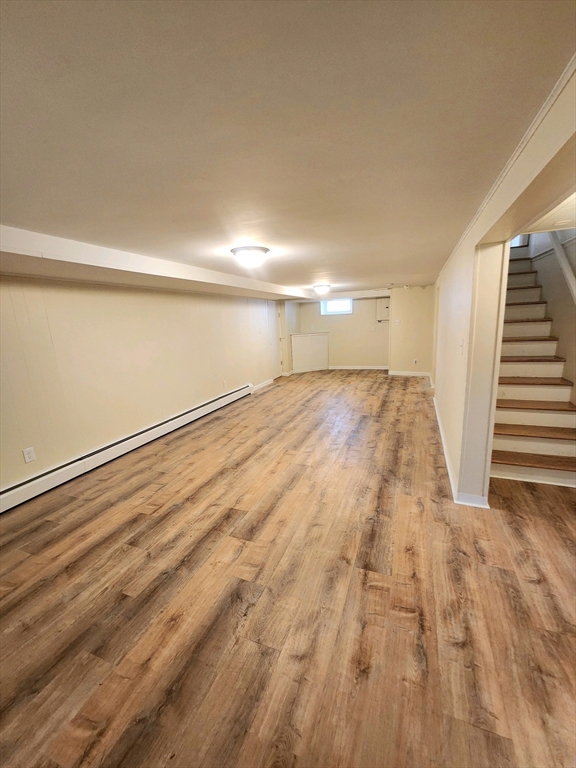 44 Bowes Avenue Quincy, MA 02169 - Photo 14 of 20 a view of empty room with wooden floor