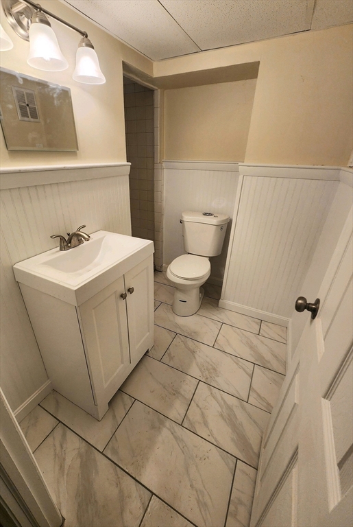 44 Bowes Avenue Quincy, MA 02169 - Photo 16 of 20 a bathroom with a sink toilet and vanity