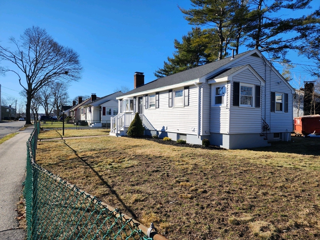 44 Bowes Avenue Quincy, MA 02169 - Photo 3 of 20 a front view of a house with a yard