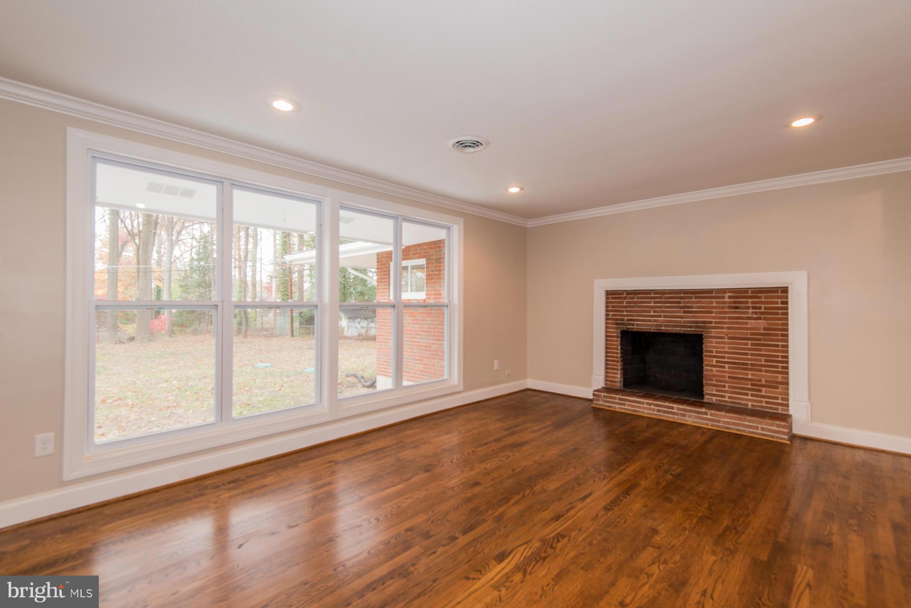 4 Sheraton Road Randallstown, MD 21133 - Photo 9 of 30 Living Room w/wood burning fireplace