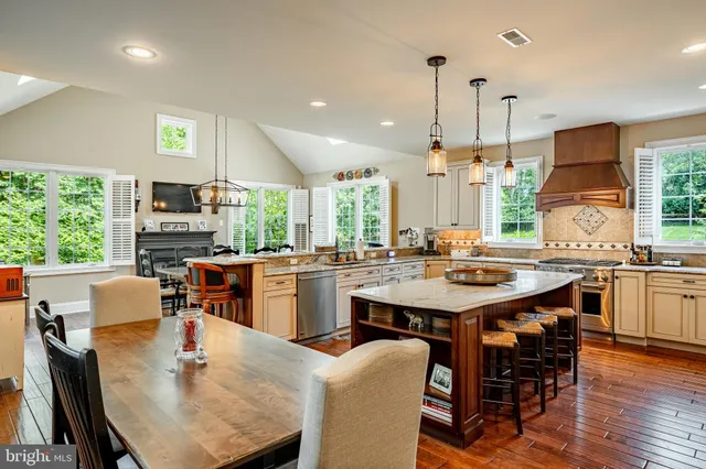 a kitchen with a stove and a cabinets