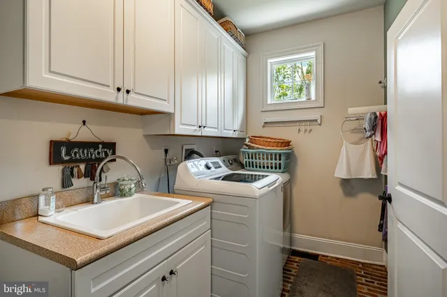 a bathroom with a toilet sink and shower