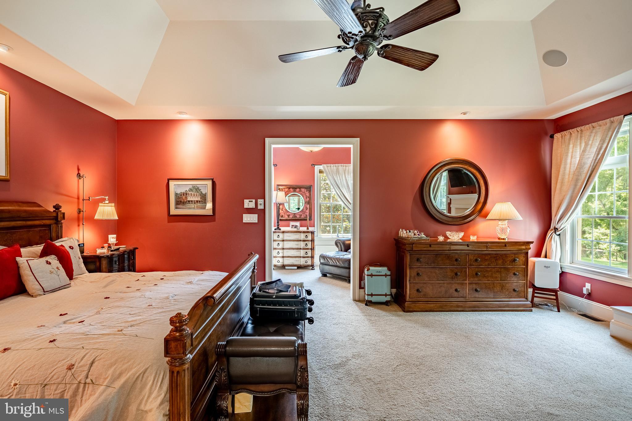 211 Dutton Mill Road West Chester, PA 19380 - Photo 22 of 71 a bedroom with a bed and a chandelier