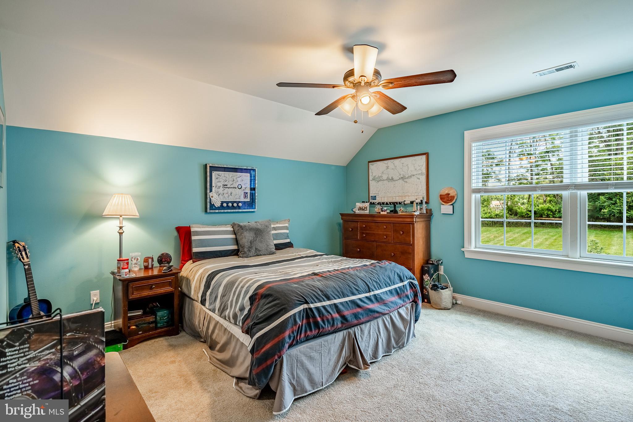 211 Dutton Mill Road West Chester, PA 19380 - Photo 30 of 71 a bedroom with a bed and a chandelier